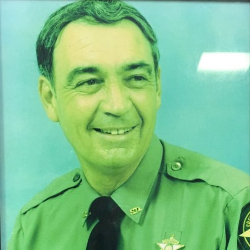 Portrait aux couleurs délavées du shériff Frank Baker