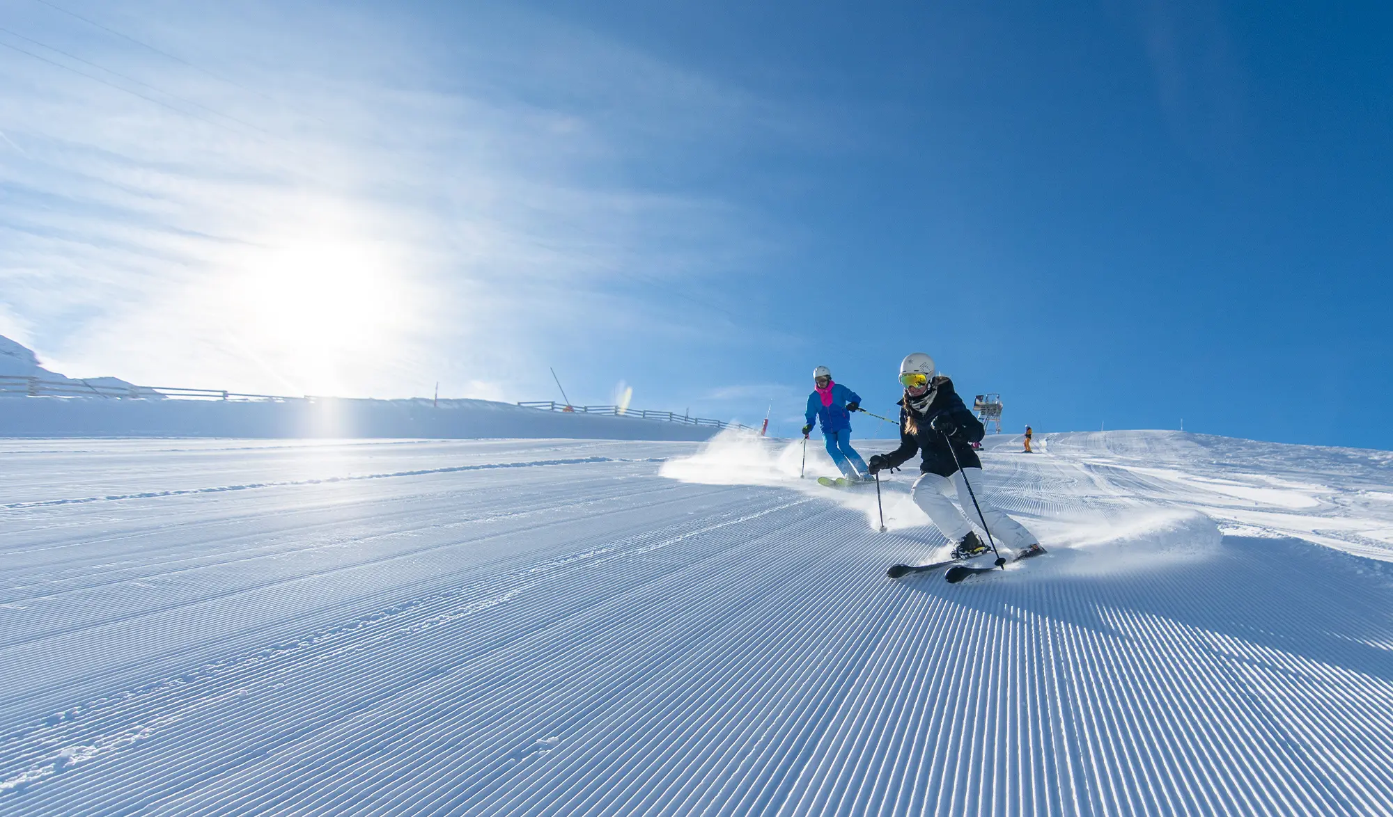 skieurs neige damée Val Thorens